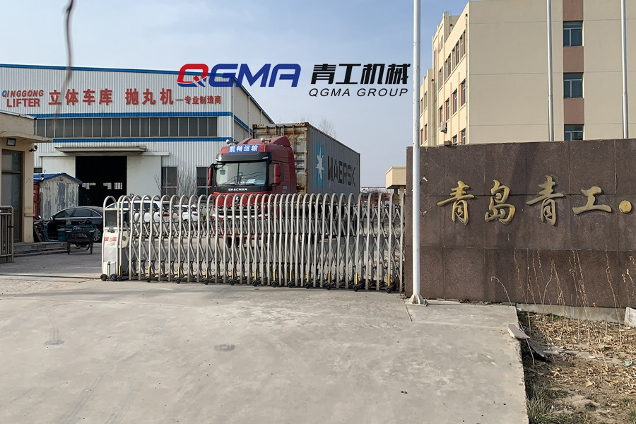 意昂注册钢管抛丸机自动上下料装置装箱发往印尼